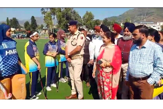 Chief guest SP Sachin Gupta interacting with hockey players at Poonch.