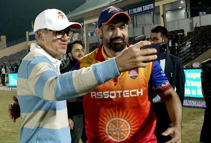 Omar Abdullah taking a selfie with cricketer Irfan Pathan at Bakshi Stadium in Srinagar on Saturday. -Excelsior/Shakeel