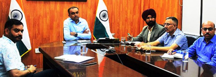 Div Com Jammu Ramesh Kumar chairing a meeting.