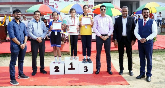 Dignitaries posing along with winners during an Annual Sports and Founders’ Day programme.