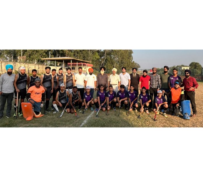 Hockey teams posing along with dignitaries during a tournament.