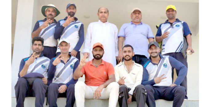 SKUAST-Jammu cricket team posing with officials after a match.