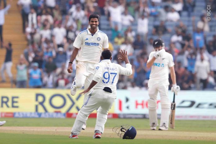 Washington Sundar celebrating after taking seven wickets against New Zealand on Thursday.