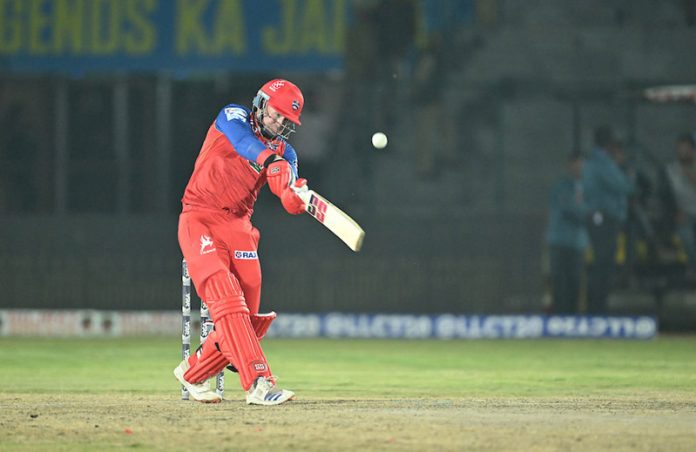 Ben Dunk of India Capitals in action during his inning of 97 runs from 47 balls against Manipal Tigers at Bakshi Stadium, Srinagar.