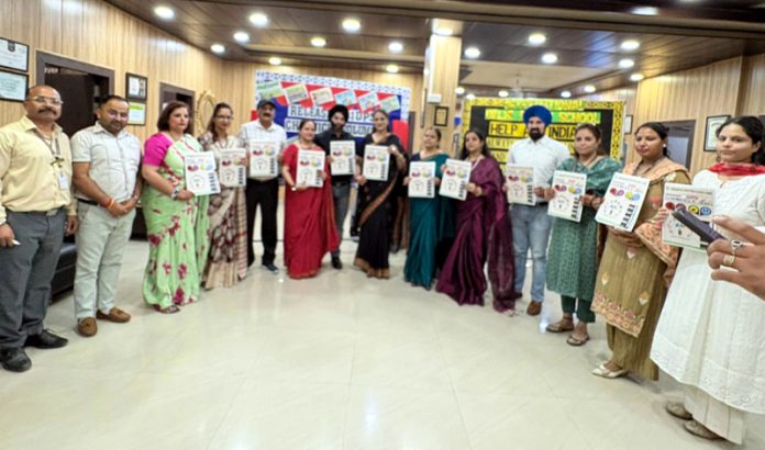 Chairperson of Khadi Village Dr Hina Shafi Bhat releasing 7th Edition of IDPS Chronicle in Jammu on Monday.