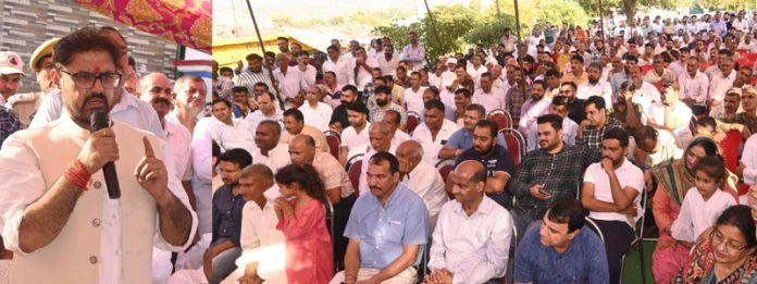 Minister for FCS&CA Satish Sharma addressing a public gathering in Chhamb constituency.