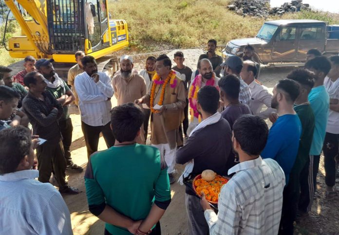 DDC Chairman Kathua Col Mahan Singh and MLA Basohli Thakur Darshan Kumar starting construction work of a crucial link road in Kathua.