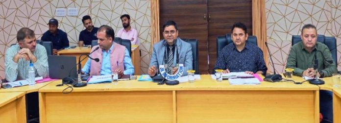 DDC Kishtwar Rajesh Kumar Shavan chairing a meeting on Friday.