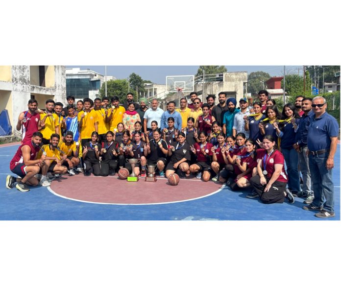 Winning teams posing along with dignitaries during Inter-Collegiate Sports Tourney at Jammu University.