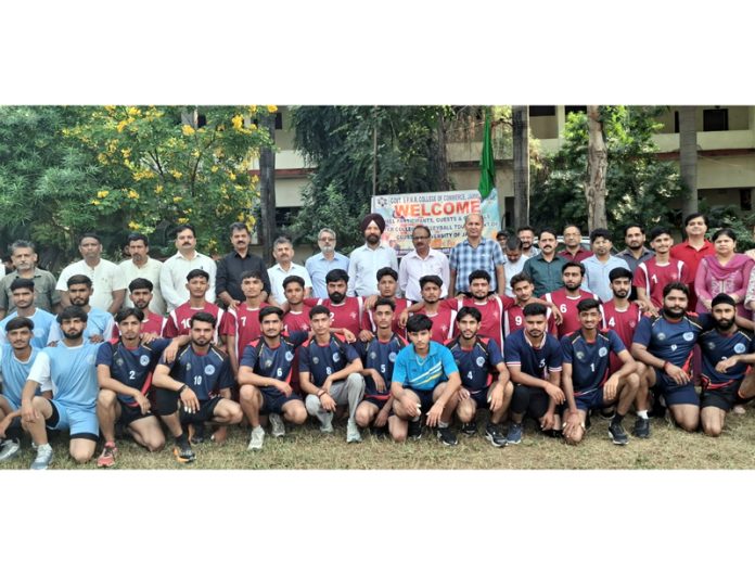 Volleyball players posing along with dignitaries during an event.