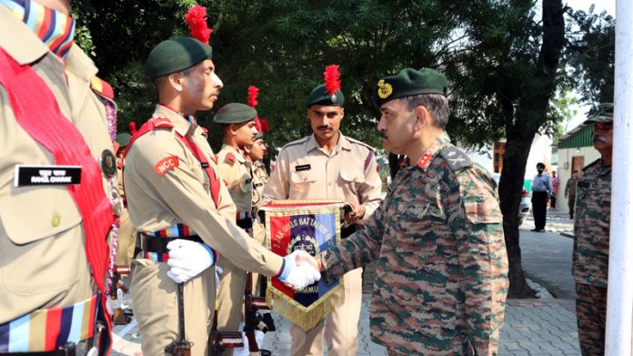 Major General R K Sachdeva interacting with NCC cadets in Nagrota on Friday.