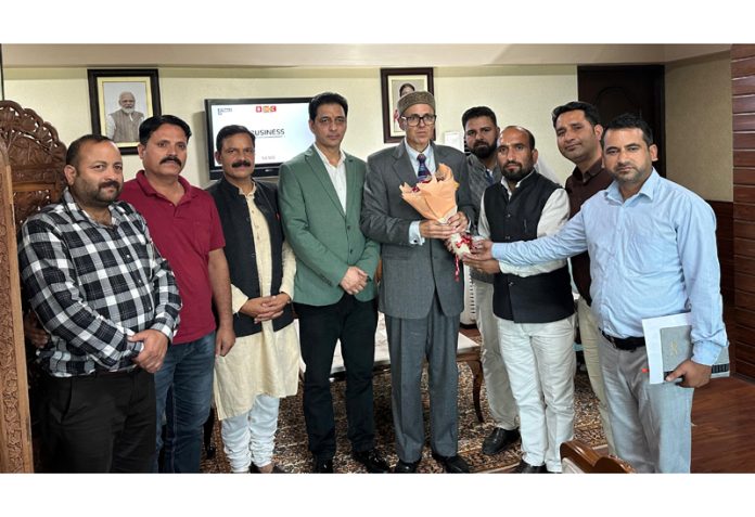 Members of JKTA delegation posing with CM Omar Abdullah at Civil Secretariat, Srinagar.