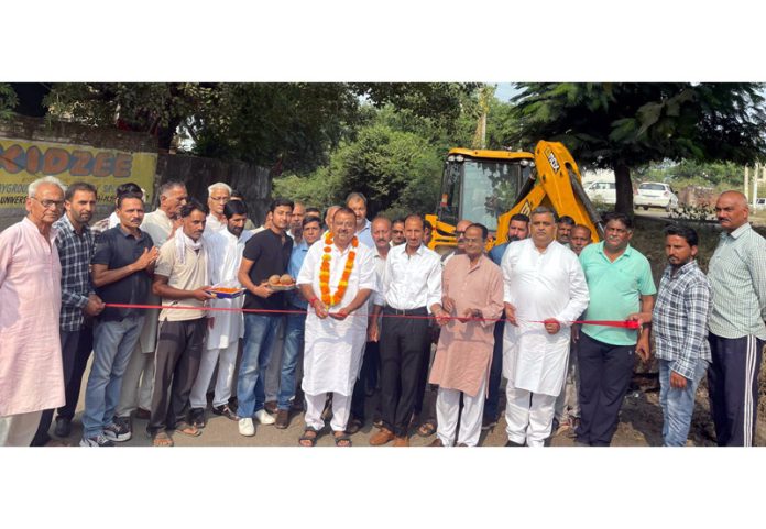 MLA Vijaypur C P Ganga kick starting widening of Badhori link road on Monday.