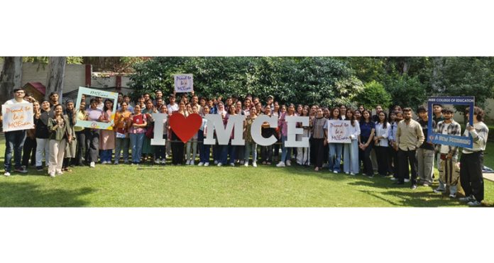 Students at MIER College of Education posing for a group photograph with faculty members and others during induction programme.