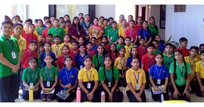 Students of Shri Ram Universal School posing with dignitaries during their educational visit to Satish Dhawan Centre for Space Sciences at Jammu.