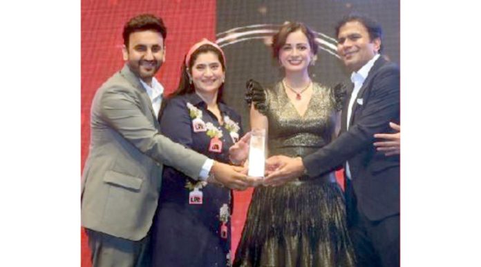 Aman Talla, Managing Director of Talla Jewellers receiving the awards during a function held on Thursday.