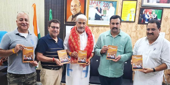 Nasib Singh along with others presenting a book to MLA, Sham Lal Sharma in Jammu on Friday.