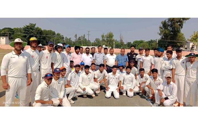 Cricket teams posing for group photograph at Kathua.