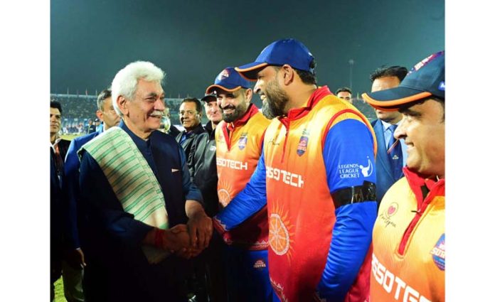 LG Manoj Sinha interacting with players during final match of LLC at Bakshi Stadium, Srinagar on Wednesday.