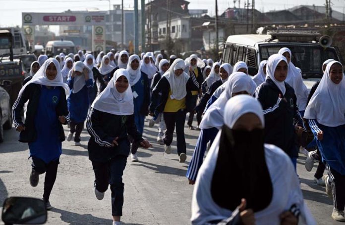 Students take part in the annual cross country run 2024 organised by SBEI at Ompora, Budgam on Saturday.