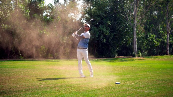 Kartik Sharma in action during 3rd day of J&K Open 2024 at Jammu Tawi Golf Course.