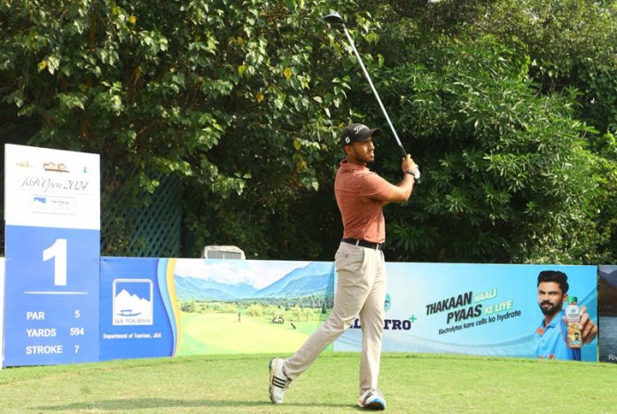 Golfer in action during opening day of J&K Open 2024 at Jammu Tawi Golf Course.