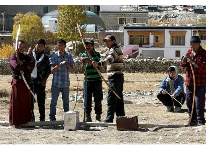 Archers in action during Archery Tournament at Tangtse.