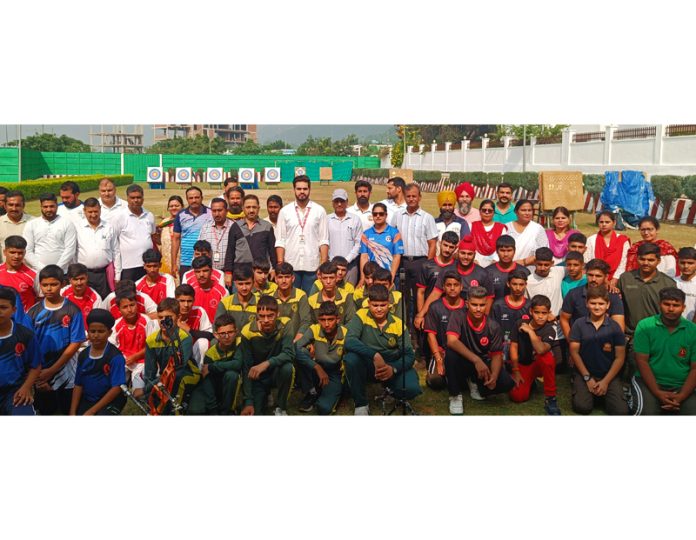 Archers posing along with dignitaries during a Championship at Katra.