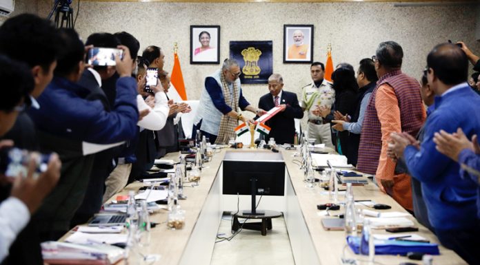 Giriraj Singh handing over GI Certificate to LG Ladakh