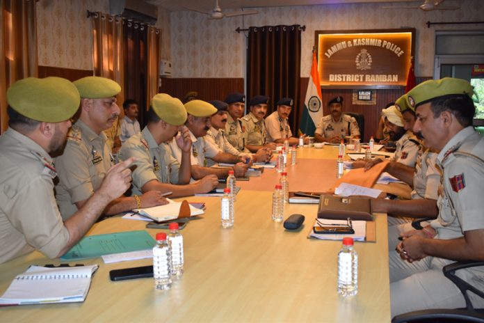 DIG DKR Range Shridhar Patil chairing a meeting of police officers in Ramban on Friday.