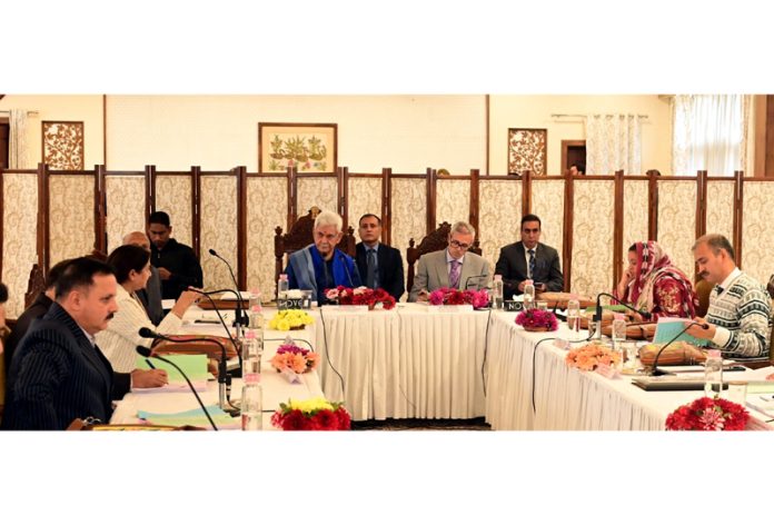 LG Manoj Sinha chairing meeting of the University Council of the University of Kashmir at Raj Bhawan.