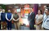 Union Minister Dr Jitendra Singh posing for photograph with senior officers of Aviation and Science & Technology Ministries after unveiling 'Pavana Chitra' Indoor "Air Quality Monitor" at Thiruvananthapuram International Airport on Thursday.