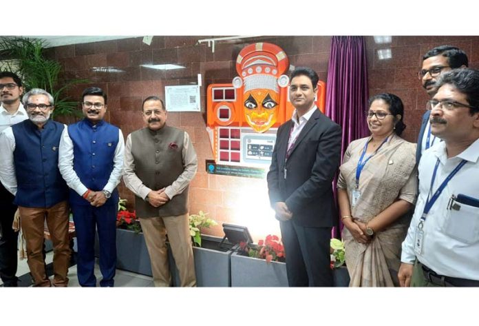 Union Minister Dr Jitendra Singh posing for photograph with senior officers of Aviation and Science & Technology Ministries after unveiling 'Pavana Chitra' Indoor 