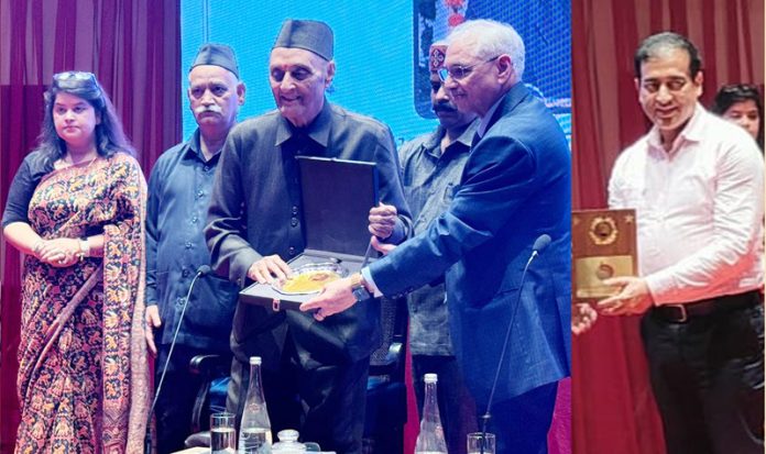 Dr. Karan Singh presenting Maharaja Gulab Singh Award to Justice Permod Kohli and Dr. Dara Singh at Jammu on Monday.