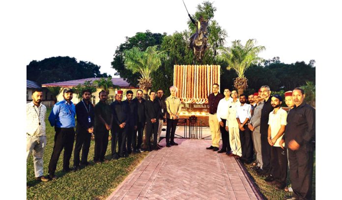 Dignitaries pose for a photograph after paying tribute to Maharaja Gulab Singh at Amar Mahal in Jammu on Sunday.