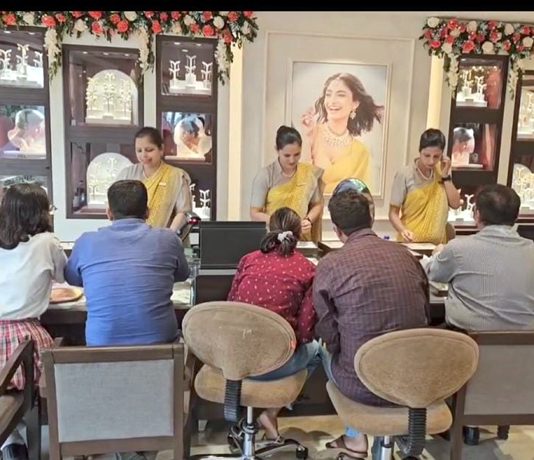 Customers busy in purchasing at re-launched store of Tanishq in Jammu on Sunday.