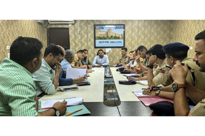 DC Jammu chairing a meeting.