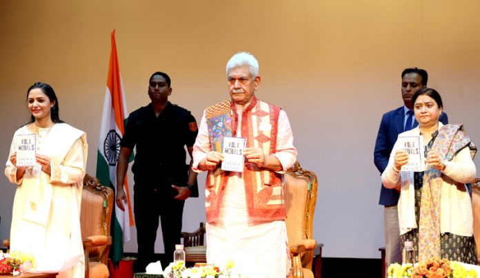 LG Manoj Sinha releasing Shehla Rashid’s book in Srinagar on Sunday. -Excelsior/Shakeel