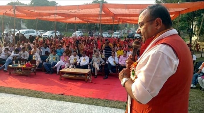 MLA Bahu, Ch. Vikram Randhawa addressing a public meeting at Raipur Satwari on Sunday.