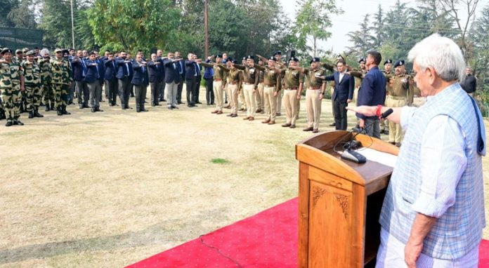 LG Manoj Sinha administering pledge to officers at Raj Bhawan Srinagar.