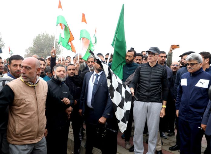 Chief Minister Omar Abdullah flagging off 'Run for Unity' from SKICC in Srinagar on Tuesday. — Excelsior/Shakeel