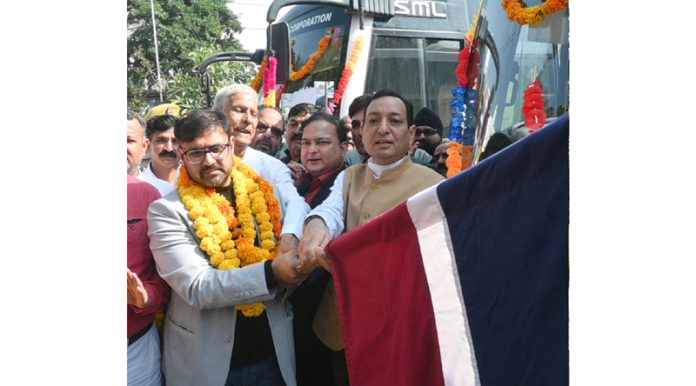 Transport Minister, Satish Sharma flagging off buses for different routes in Jammu on Thursday.