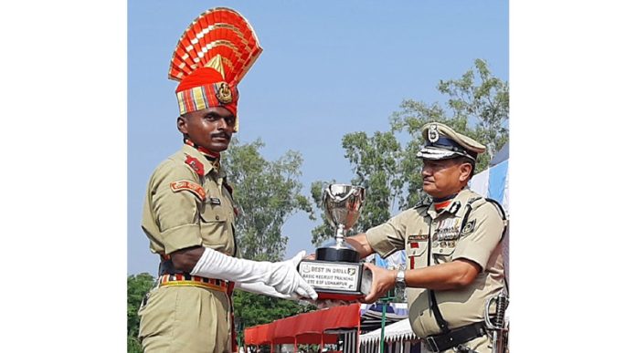 IG STC BSF presenting Best Cadet award during attestation-cum-passing out parade.