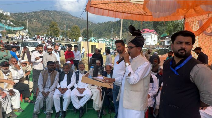 MLA Muzaffar Khan addressing public meeting at Thannamandi on Saturday.