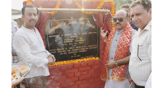 DyCM Surinder Choudhary inaugurating newly constructed road to Chandi Mata temple in Nowshera.