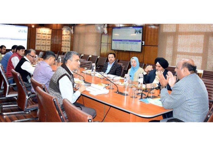 DyCM Surinder Kumar Choudhary chairing a meeting on Thursday.