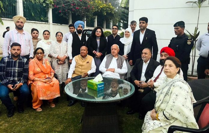 NC President Dr Farooq Abdullah meeting with a delegation.