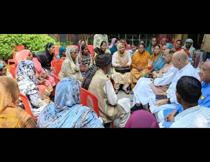 Sr BJP leader Devender Singh Rana interacting with deputations on Friday.