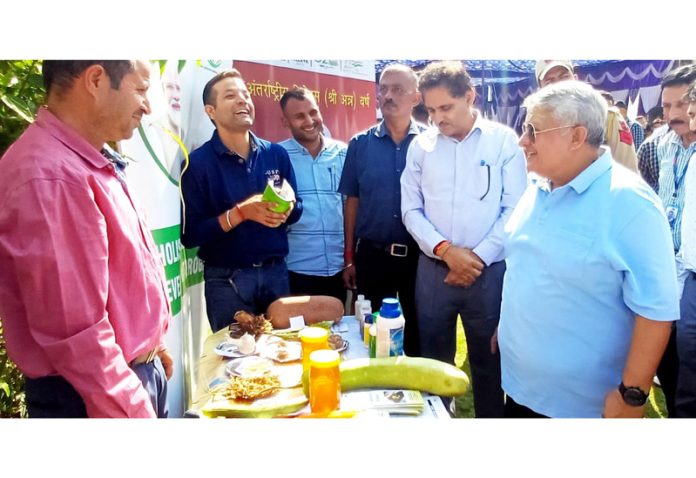 DDC Reasi, Vishesh Mahajan inspecting a stall during Block Diwas.