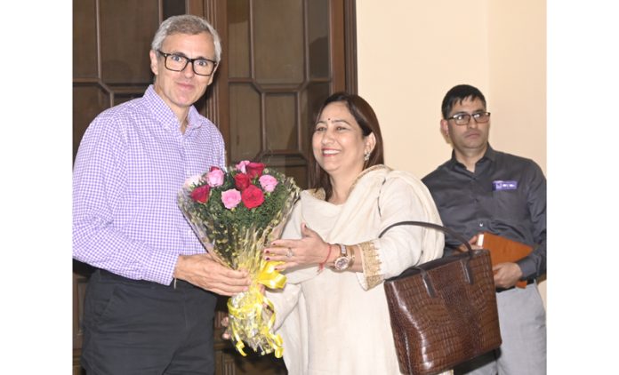 JAKFAS president Rashim Deepika Razdan presenting a bouquet of flowers to CM Omar Abdullah on Sunday.